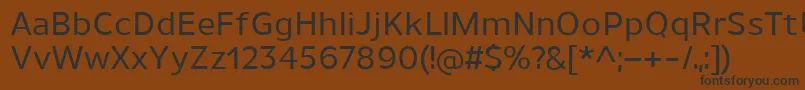 UnimanMedium Font – Black Fonts on Brown Background