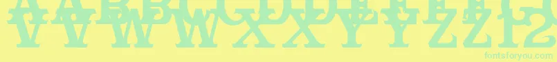 Cabbagetownsmcaps-Schriftart – Grüne Schriften auf gelbem Hintergrund