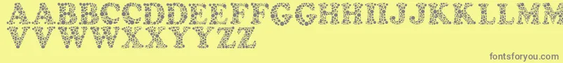 Amydorフォントについての詳細 フォントAmydor – 黄色の背景に灰色の文字