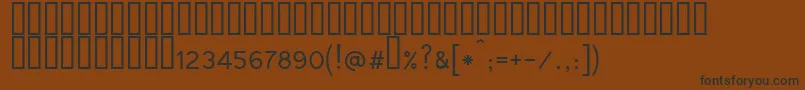 Tunga Font – Black Fonts on Brown Background