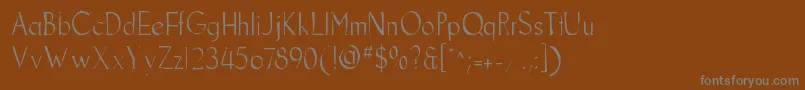 Goodfishgaunt-fontti – harmaat kirjasimet ruskealla taustalla
