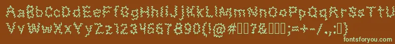MonsterTaxi-Schriftart – Grüne Schriften auf braunem Hintergrund