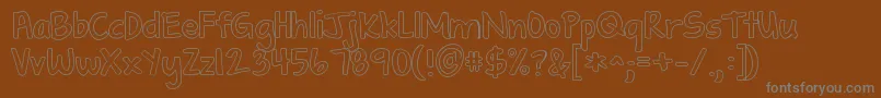 Kgshadowofthenight-fontti – harmaat kirjasimet ruskealla taustalla
