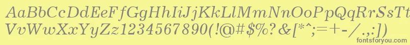 フォントJournalcttItalic – 黄色の背景に灰色の文字