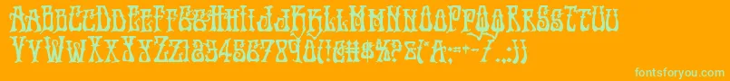 Instantzenbold-Schriftart – Grüne Schriften auf orangefarbenem Hintergrund