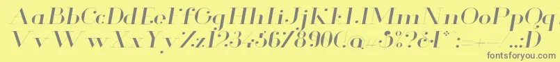 GlamorLightextendeditalic-fontti – harmaat kirjasimet keltaisella taustalla