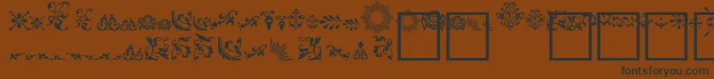 More about FleurdesignDingbats Font FleurdesignDingbats Font – Black Fonts on Brown Background