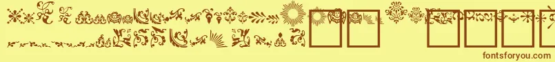 FleurdesignDingbats Font – Brown Fonts on Yellow Background