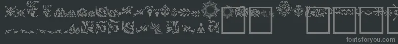 Czcionka FleurdesignDingbats – szare czcionki na czarnym tle