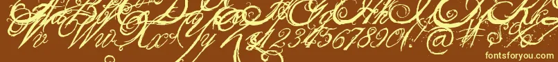 TheKingQueenFont Font – Yellow Fonts on Brown Background