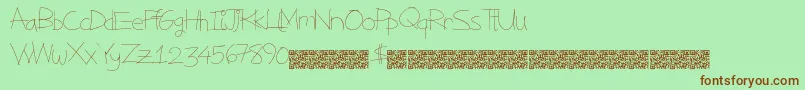 Magicstatus Font – Brown Fonts on Green Background