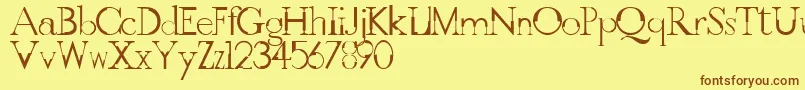 フォントGothicvilleFont – 茶色の文字が黄色の背景にあります。