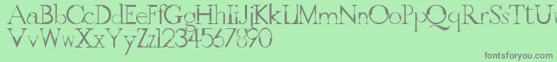 Fonte GothicvilleFont – fontes cinzas em um fundo verde