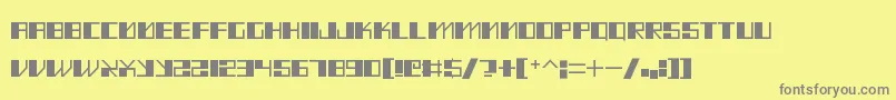 MadMeka-fontti – harmaat kirjasimet keltaisella taustalla