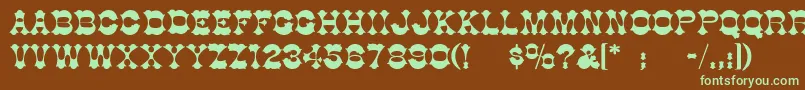 フォントBurninhoodThin – 緑色の文字が茶色の背景にあります。