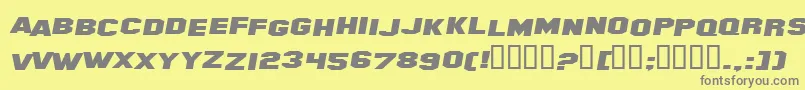 HollywoodHillsExpandedItalic-Schriftart – Graue Schriften auf gelbem Hintergrund