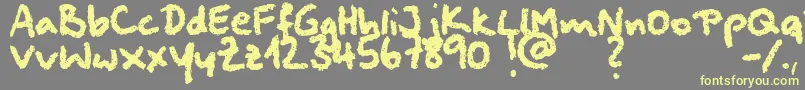 Squeakychalksound Font – Yellow Fonts on Gray Background