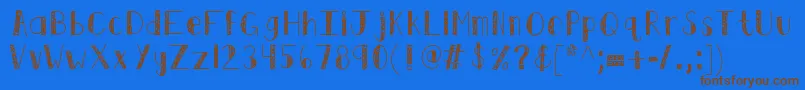 Kbswirlntwirl-Schriftart – Braune Schriften auf blauem Hintergrund