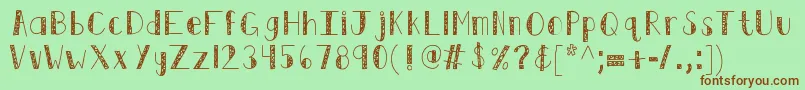 Fonte Kbswirlntwirl – fontes marrons em um fundo verde