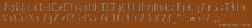 Kbswirlntwirl Font – Gray Fonts on Brown Background