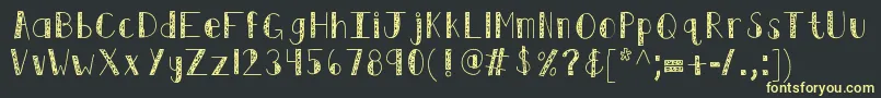 Kbswirlntwirl Font – Yellow Fonts on Black Background