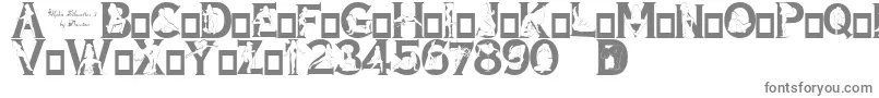 フォントAlphaSilouettes3 – 白い背景に灰色の文字