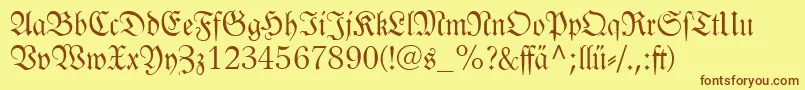 フォントLinotypelutherschefrakturdfr – 茶色の文字が黄色の背景にあります。
