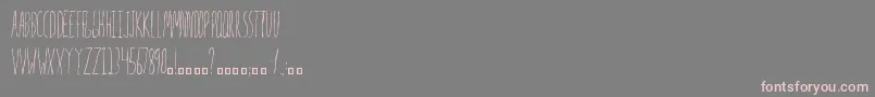 Strange-Schriftart – Rosa Schriften auf grauem Hintergrund