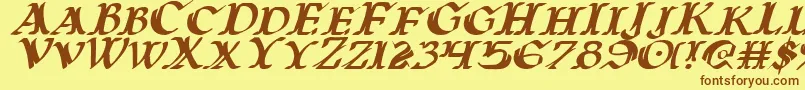 Warasgardi Font – Brown Fonts on Yellow Background