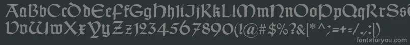 フォントTypographerUncialgotisch – 黒い背景に灰色の文字