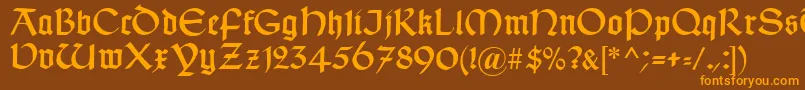 TypographerUncialgotisch Font – Orange Fonts on Brown Background