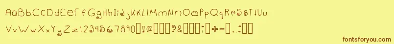 Dangowee Font – Brown Fonts on Yellow Background
