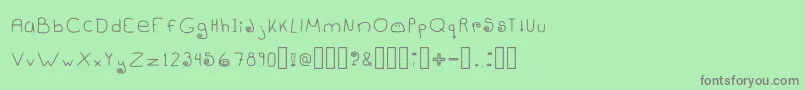 Dangowee Font – Gray Fonts on Green Background