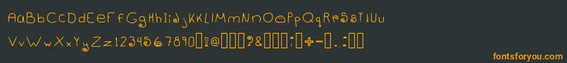 Czcionka Dangowee – pomarańczowe czcionki na czarnym tle