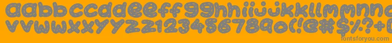 フォントKawaiiStitch – オレンジの背景に灰色の文字