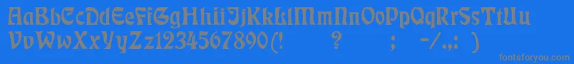 Badmann-fontti – harmaat kirjasimet sinisellä taustalla