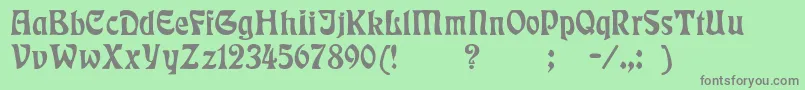 Badmann-fontti – harmaat kirjasimet vihreällä taustalla