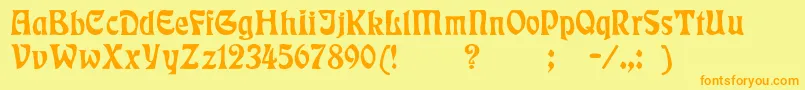 フォントBadmann – オレンジの文字が黄色の背景にあります。