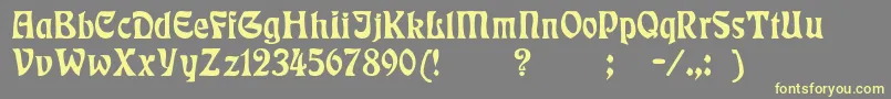 Badmann Font – Yellow Fonts on Gray Background