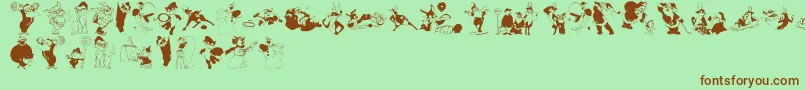 Fonte Xmasone – fontes marrons em um fundo verde