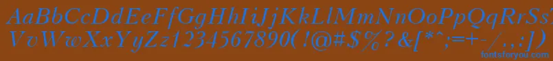 Czcionka UkrainiankudriashovItalic – niebieskie czcionki na brązowym tle