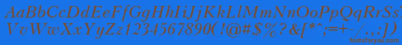 フォントUkrainiankudriashovItalic – 茶色の文字が青い背景にあります。