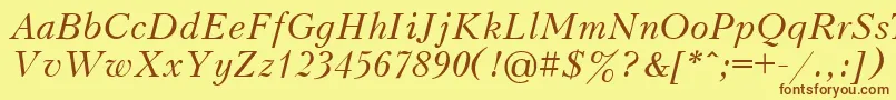 UkrainiankudriashovItalic-Schriftart – Braune Schriften auf gelbem Hintergrund