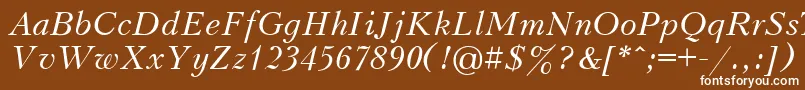 UkrainiankudriashovItalic-fontti – valkoiset fontit ruskealla taustalla