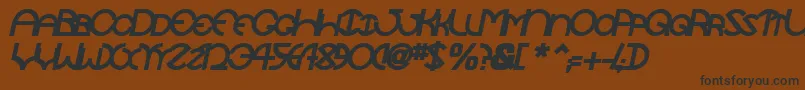 TocopillascapssskBolditalic Font – Black Fonts on Brown Background