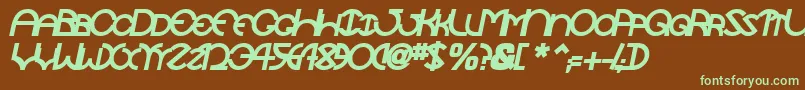 フォントTocopillascapssskBolditalic – 緑色の文字が茶色の背景にあります。