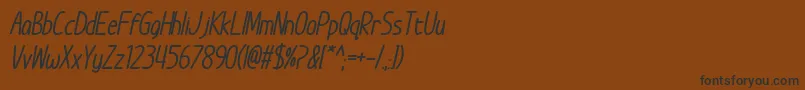 Шрифт ImWunderlandBoldItalic – чёрные шрифты на коричневом фоне