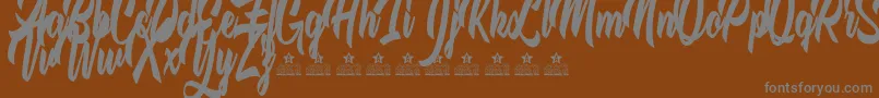 フォントTheQuickFoxPersonalUse – 茶色の背景に灰色の文字