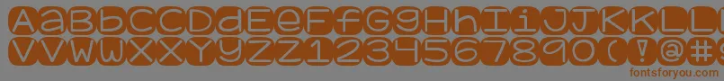 Kggeronimoblocks Font – Brown Fonts on Gray Background