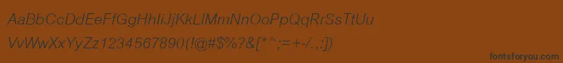 フォントCordiaNewItalic – 黒い文字が茶色の背景にあります